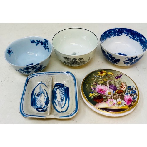 339 - An 18th century Worcester blue and white tea bowl, 8 cm diameter, two other tea bowls, a 19th centur... 