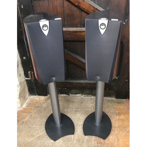 100 - An Arcam stereo and a pair of speakers on stands