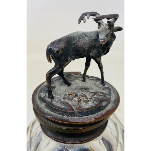 408 - A 19th century cut glass and silver plated inkwell, the finial in the form of a stag, 16 cm high