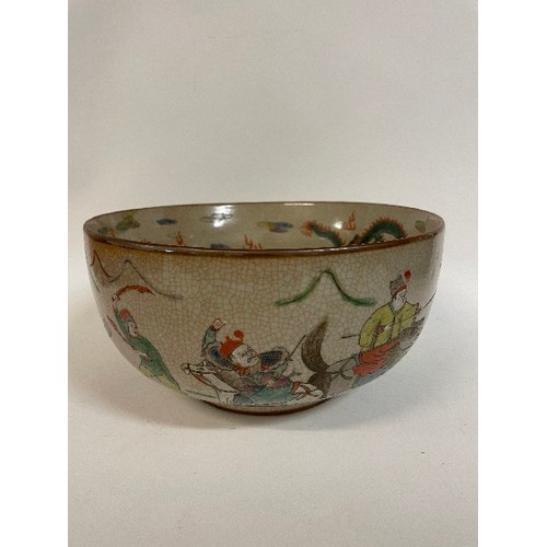 660 - A Chinese famille rose low comport, decorated birds and foliage on a celadon ground, 27 cm diameter,... 