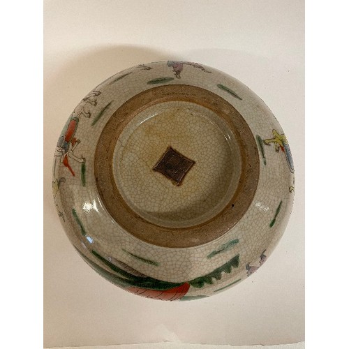 660 - A Chinese famille rose low comport, decorated birds and foliage on a celadon ground, 27 cm diameter,... 