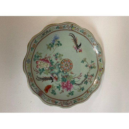 660 - A Chinese famille rose low comport, decorated birds and foliage on a celadon ground, 27 cm diameter,... 