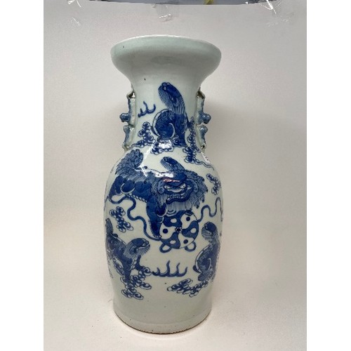 651 - A Chinese blue and white vase, decorated a Dog of Fo, in underglaze blue, 43 cm high