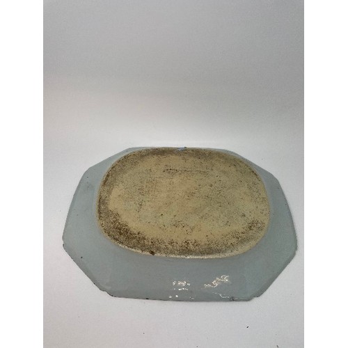 653 - An early 19th century Chinese meat plate, decorated flowers and foliage in underglaze blue, rim chip... 