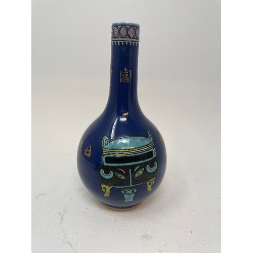 656 - A Chinese blue ground bottle vase, decorated vases and character marks, four character mark to base,... 