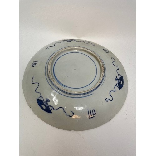 659 - A pair of Japanese Imari chargers, 30.5 cm diameter, and six others similar (8)