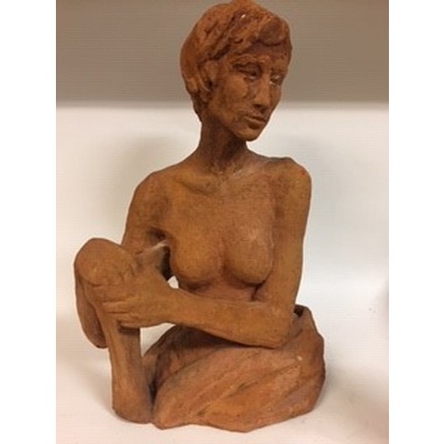 613 - An earthenware sculpture, of a nude lady, 56 cm high