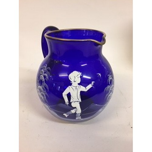 607 - A Mary Gregory style blue glass jug, 18 cm high, an opaque glass vase, painted flowers, 35 cm high, ... 