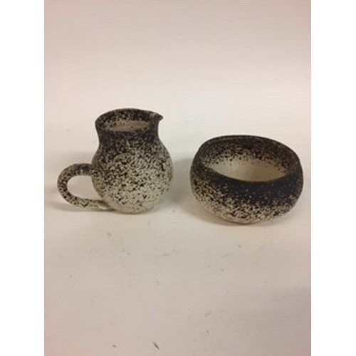 606 - A studio pottery jug and bowl, decorated mottled glaze, impressed John Lennon  (2)