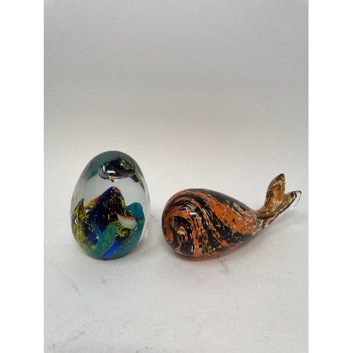 616 - A novelty glass paperweight, in the form of a whale and 100 other glass and novelty paperweights (5 ... 