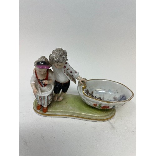 623 - A Meissen figural salt, the bowl interior painted figures and ships, 15 cm wide