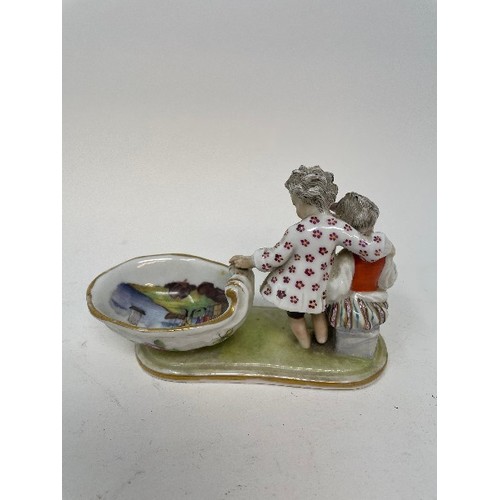623 - A Meissen figural salt, the bowl interior painted figures and ships, 15 cm wide