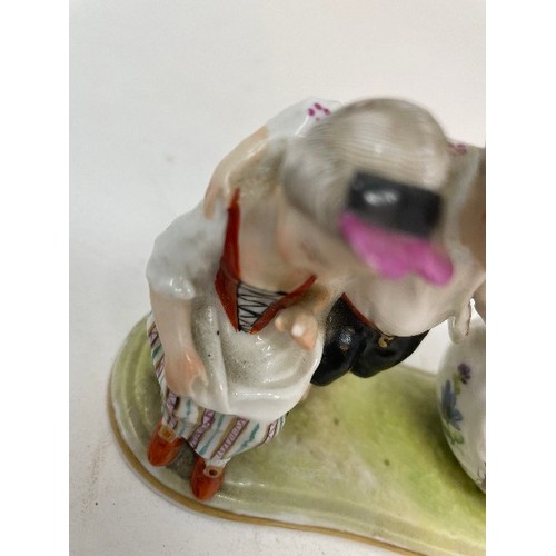 623 - A Meissen figural salt, the bowl interior painted figures and ships, 15 cm wide