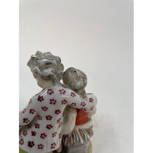 623 - A Meissen figural salt, the bowl interior painted figures and ships, 15 cm wide