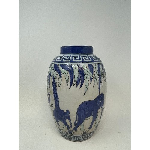 626 - A pottery vase, decorated elephants, 28 cm high