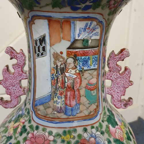 658 - A Chinese famille rose export vase, decorated figures, birds and foliage, riveted and glued, 59.5 cm... 