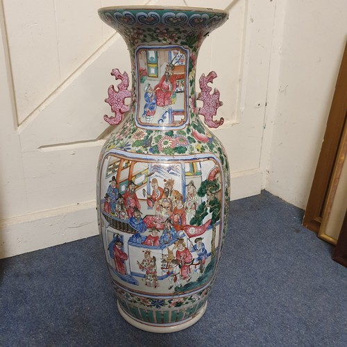 658 - A Chinese famille rose export vase, decorated figures, birds and foliage, riveted and glued, 59.5 cm... 