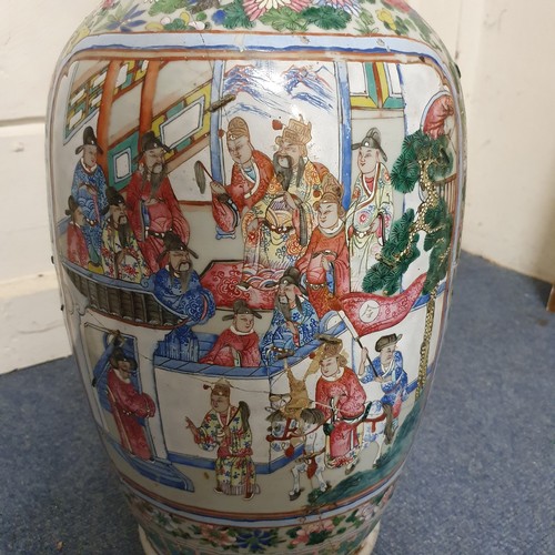 658 - A Chinese famille rose export vase, decorated figures, birds and foliage, riveted and glued, 59.5 cm... 