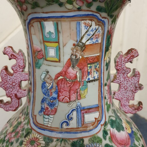 658 - A Chinese famille rose export vase, decorated figures, birds and foliage, riveted and glued, 59.5 cm... 