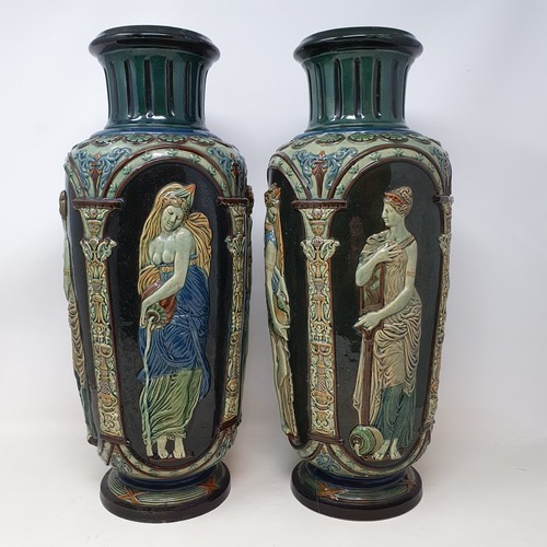 608 - A pair of Continental pottery vases, neo classical style, decorated maidens, 42 cm high