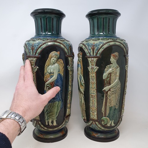 608 - A pair of Continental pottery vases, neo classical style, decorated maidens, 42 cm high