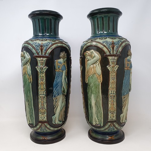 608 - A pair of Continental pottery vases, neo classical style, decorated maidens, 42 cm high