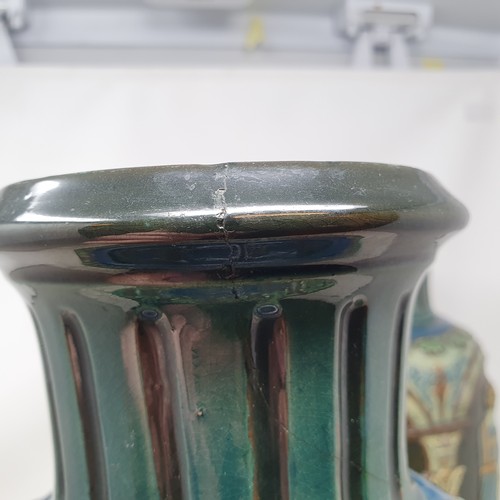 608 - A pair of Continental pottery vases, neo classical style, decorated maidens, 42 cm high