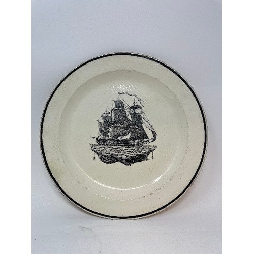 570 - A 19th century creamware plate, bat-printed with a galleon, 25 cm diameter