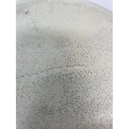 570 - A 19th century creamware plate, bat-printed with a galleon, 25 cm diameter