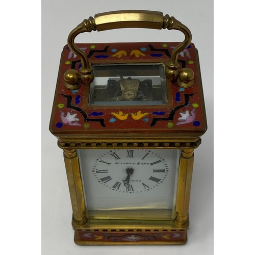 234 - A carriage timepiece, in a brass and enamel case, 11.5 cm high