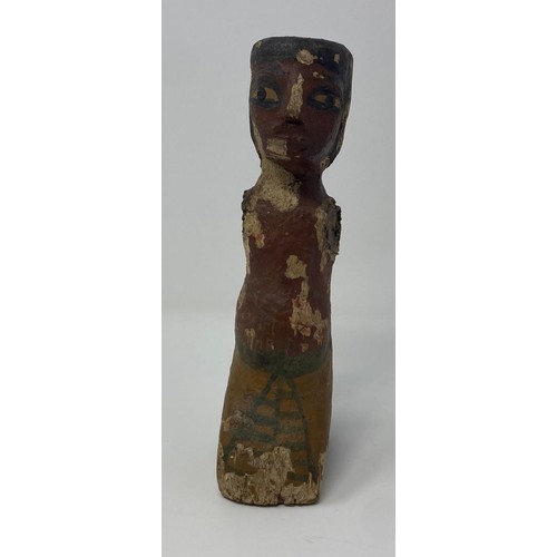 562 - An Egyptian style wooden boatman figure, with painted decoration to face and body 50 cm...