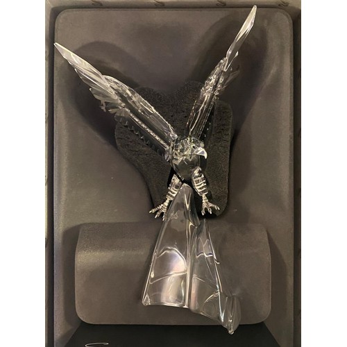 571 - A Swarovski limited edition figure, The Eagle Winging to Glory, 2099/10000, with certificate and pap... 