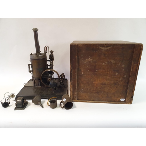 351 - An early/mid 20th century vertical steam engine, on a plinth base, with attached pulleys, 50 cm high... 