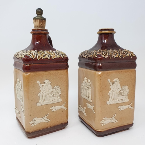 505 - A pair of Doulton Lambeth flagons, impresses Supplied to G.W. Scott & Sons Only and two Doulton ston...