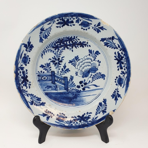 510 - A Delft plate, 31 cm diameter and two others (3)...