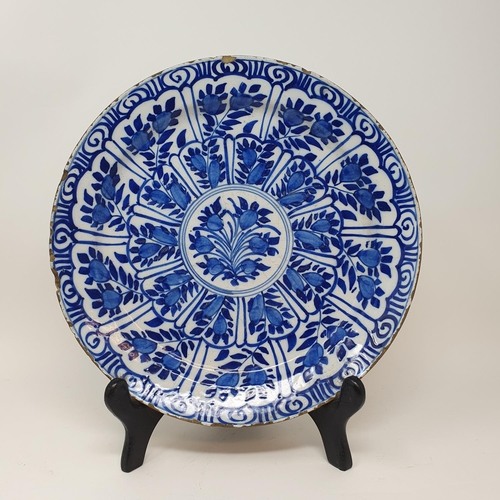 510 - A Delft plate, 31 cm diameter and two others (3)...