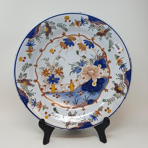 511 - A Delft polychrome plate, and four others (5)...