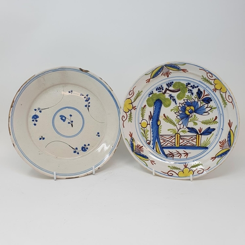 511 - A Delft polychrome plate, and four others (5)...