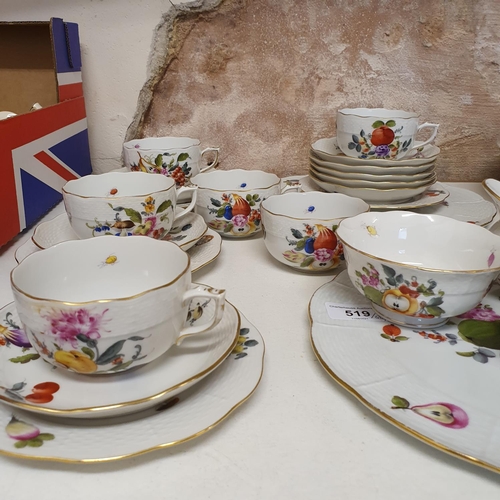 519 - An Herend part tea service, comprising two plates, four side plates, seven cups and saucers, cream j...