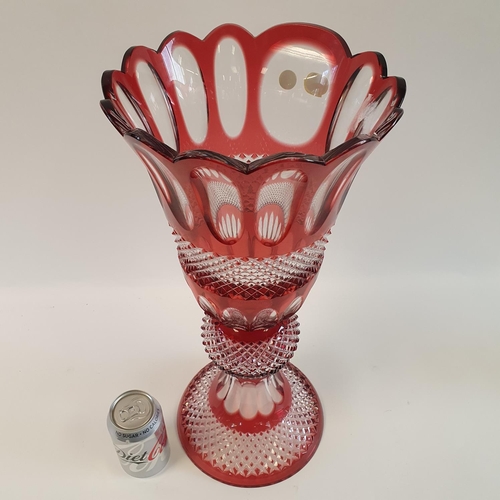 523 - A large Bohemia Crystal of the Czech Republic, red and clear cased glass vase, 50 cm high...