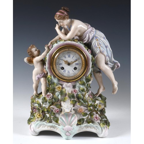 204 - A late 19th century mantel clock, the 8 cm diameter enamel dial with Roman numerals, fitted an eight... 