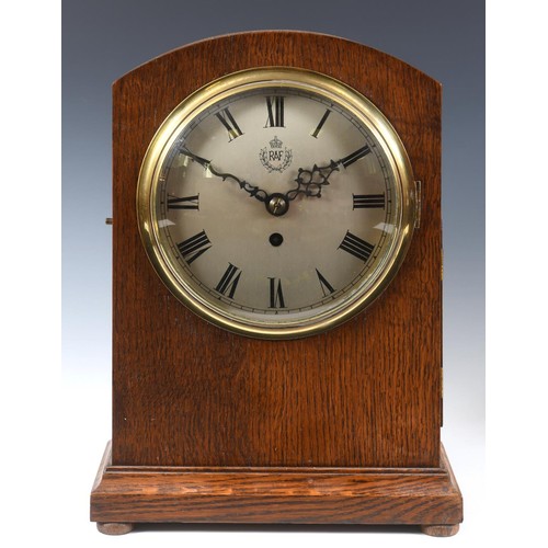 208 - A WWII MOD issue clock, the 18 cm diameter silvered dial with RAF insignia, fitted an eight day Elli... 