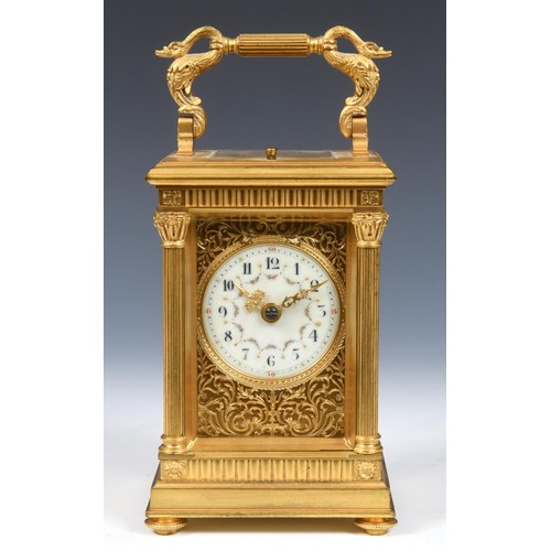 241 - A good carriage clock with repeat, the 5.5 cm diameter dial with Arabic numerals and painted floral ... 