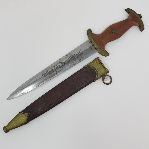 11 - A Third Reich SA dagger the blade marked Rob Giersch, Solingen, with a scabbard, stamped 15/25063, a... 