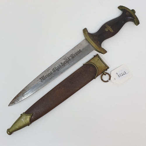 12 - A Third Reich SS dagger, the blade mark Gottleib Hammesfahr Solingen-Foch, with a scabbard, attic st...