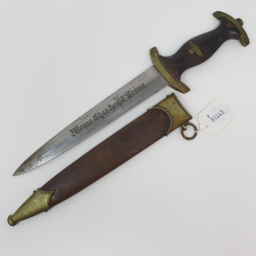 12 - A Third Reich SS dagger, the blade mark Gottleib Hammesfahr Solingen-Foch, with a scabbard, attic st... 