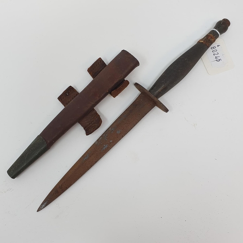 14 - A Fairbairn & Sykes style Commando fighting knife, with a scabbard
Provenance: belonged to the vendo...