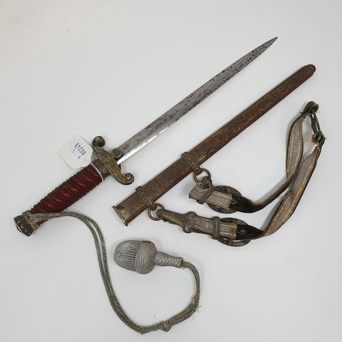 15 - A Third Reich army dagger, the blade mark E & F Horster Soliengen, with a scabbard and a hanger, att...