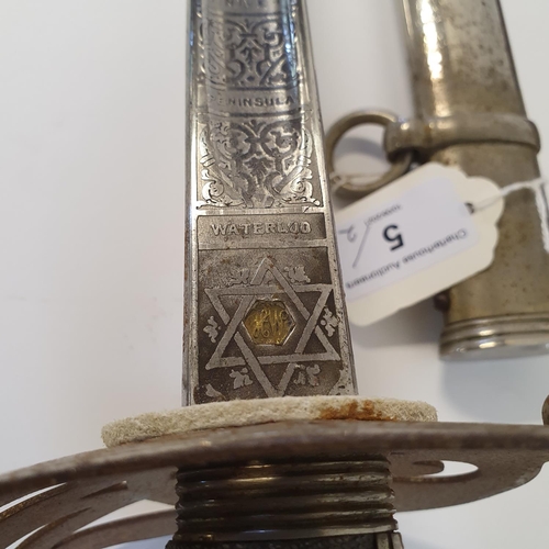 5 - A Guard's Officers Henry Wilkinson sword, the blade initialed A G and with battle honours, with a wi...