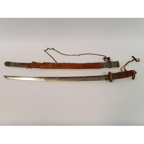 8 - A Japanese Katana, with a cord bound fishskin grip, in a painted metal scabbard
Provenance brought b... 